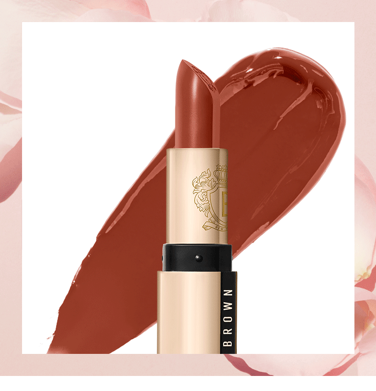 Imagine containing step 5 model applying lipstick, smiling while looking into compact Bobbi Brown mirror